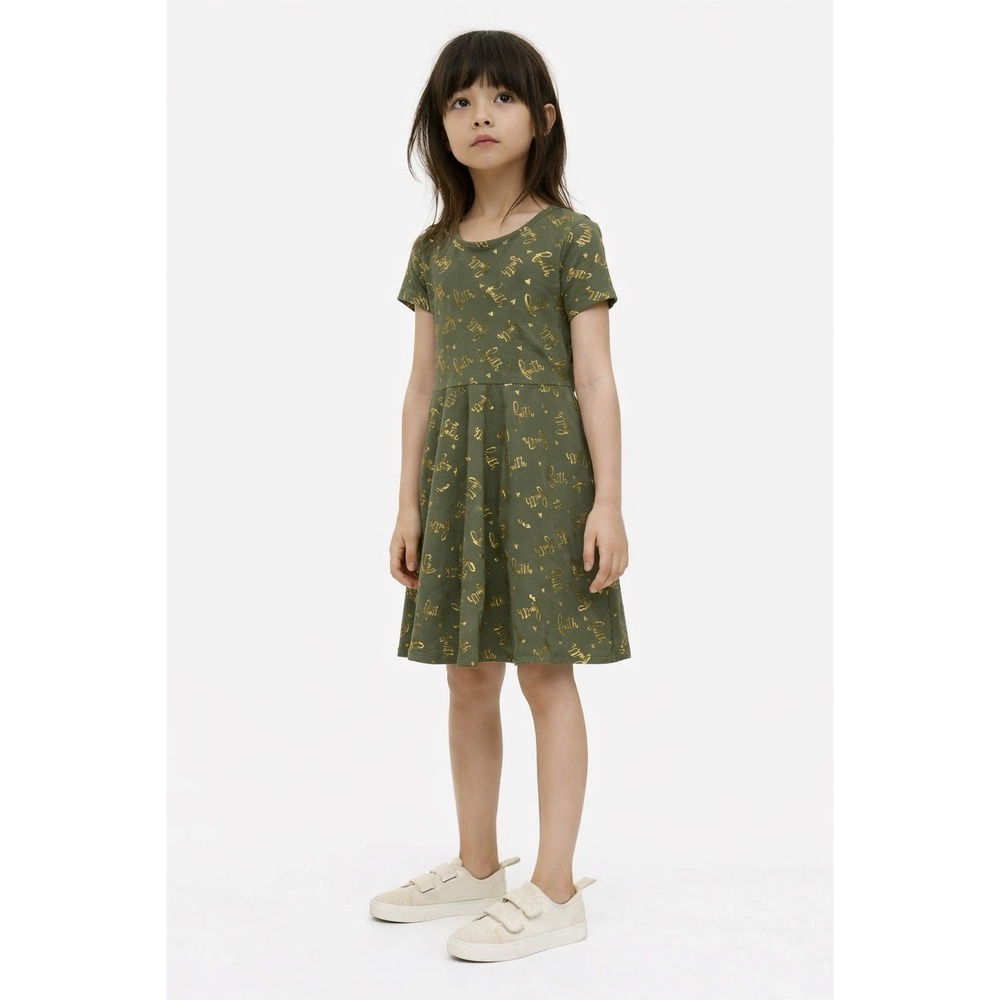 Glitter girl a green short-sleeved dress with a gold "faith" pattern. Sz 12